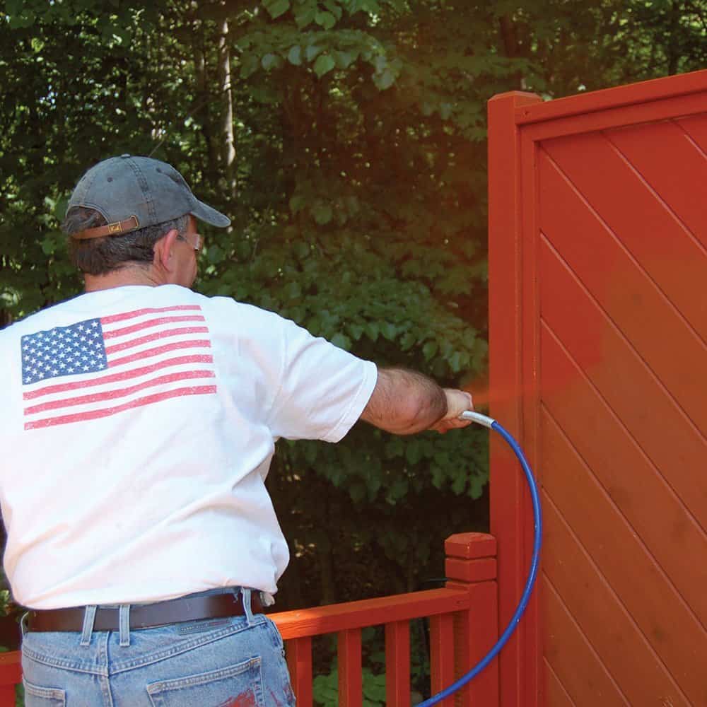 Man using a paint sprayer